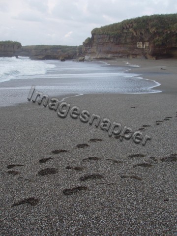 Footsteps in shingle